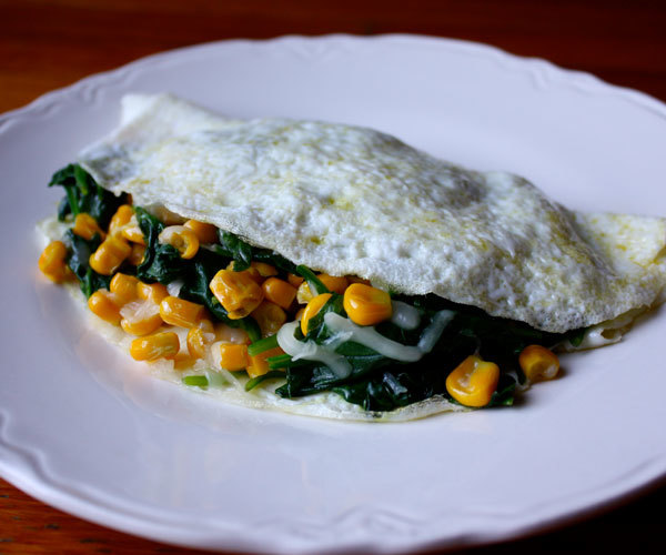 Egg white omelet with Spinach corn and gouda cheese breakfast recipe.