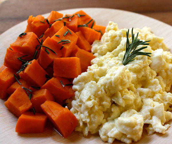 Scrambled egg whites with steamed sweet potato high-protein breakfast recipe.