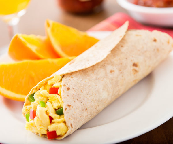 Healthy egg white breakfast burrito recipe with bell peppers and turkey bacon.