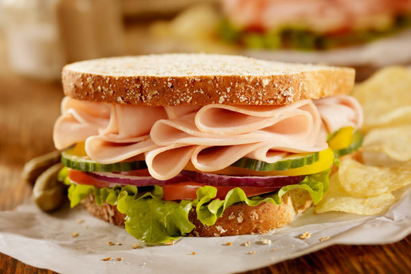 Deli meat sandwich on whole wheat bread