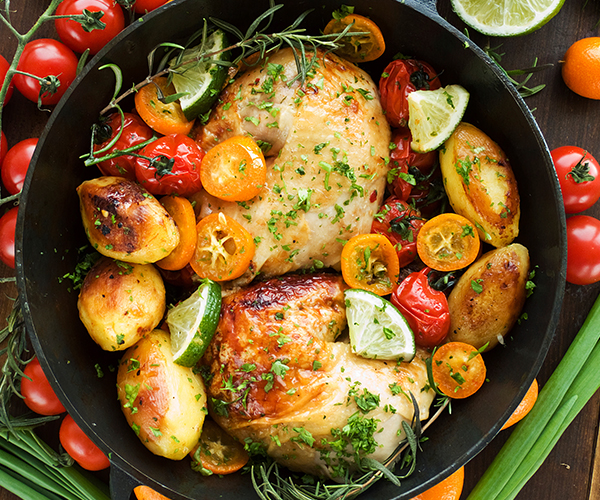 Roast Chicken Quarters with Potatoes and Tomatoes