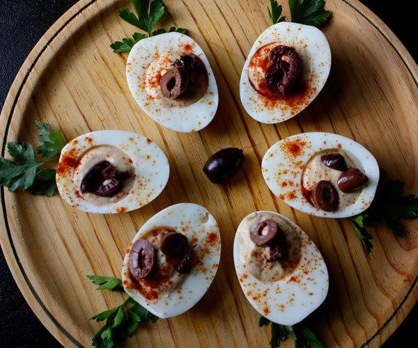 Recipe for hummus filled deviled eggs, a high-protein snack.