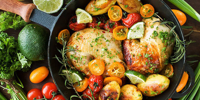 Roast Chicken Quarters with Potatoes and Tomatoes Recipe