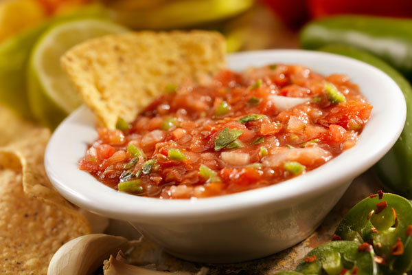 Jarred tomato salsa with chips
